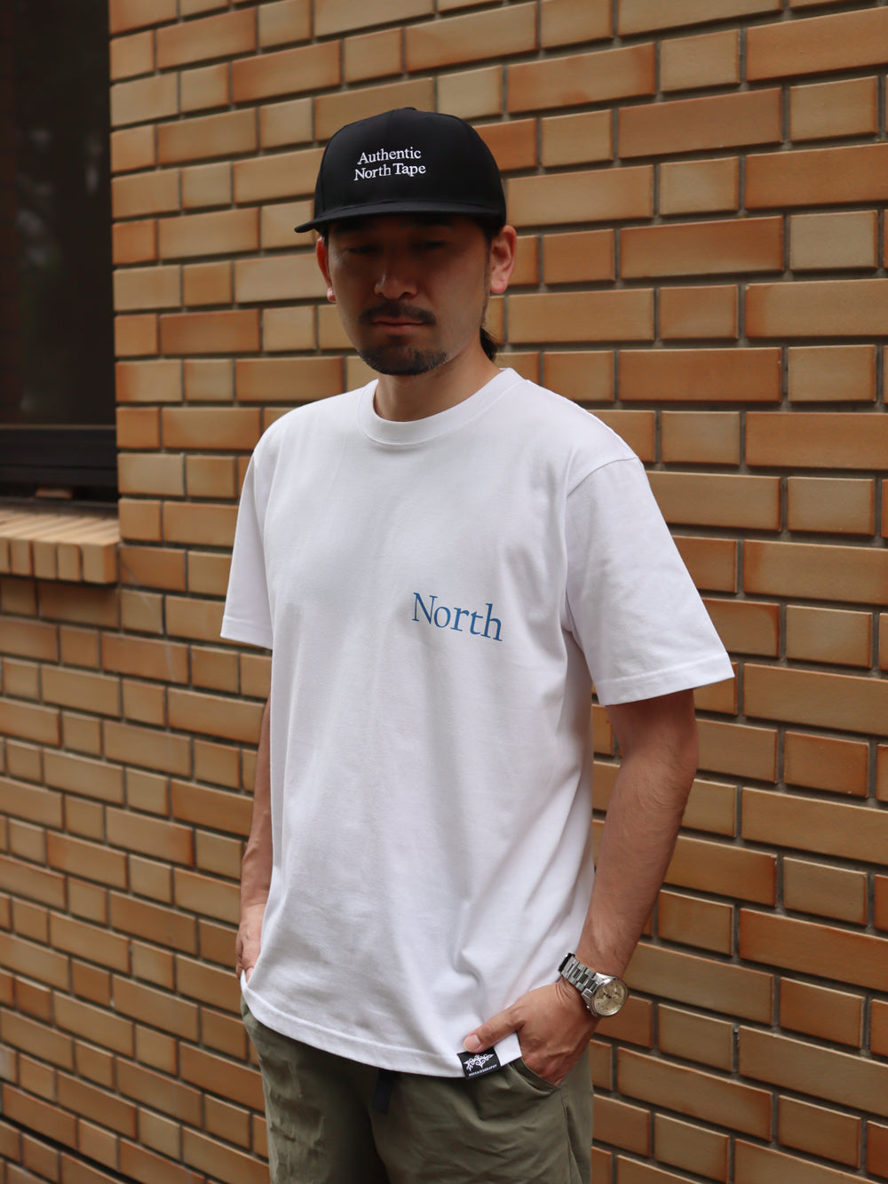 "NORTH" TEE