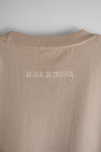 "DO LOCAL DO UNIVERSAL" TEE